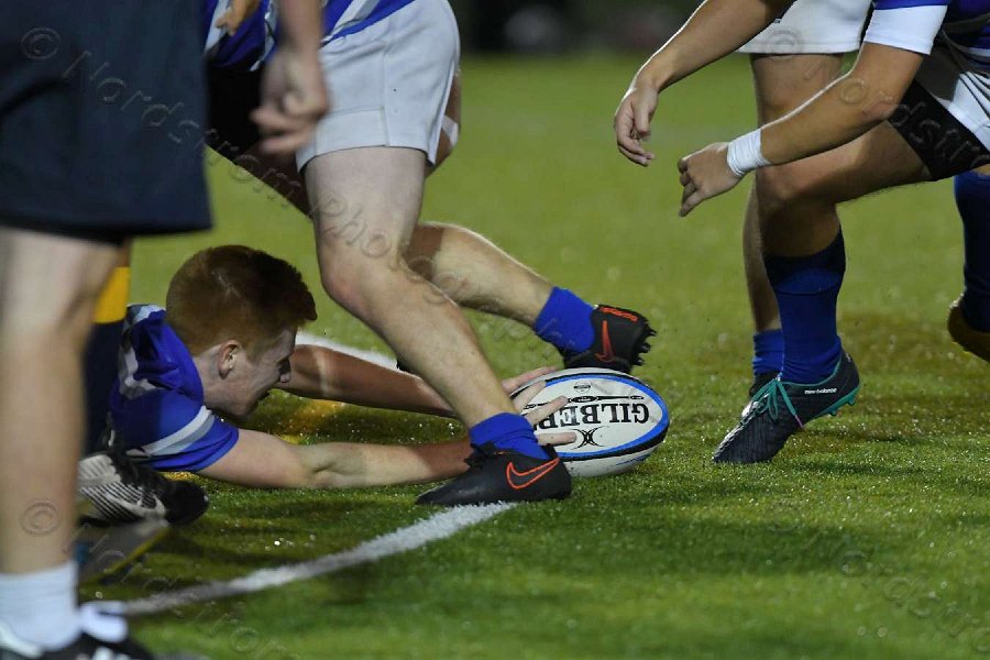 Wheaton Men\'s Rugby vs Mass Maritime.  Photo by Keith Nordstrom